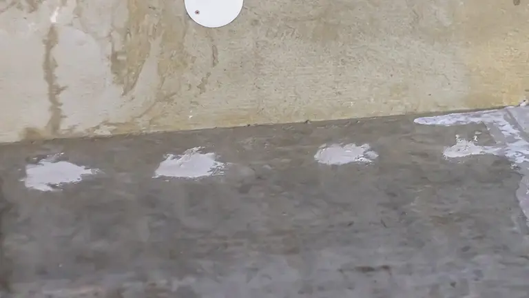 Concrete floor with sealed holes
