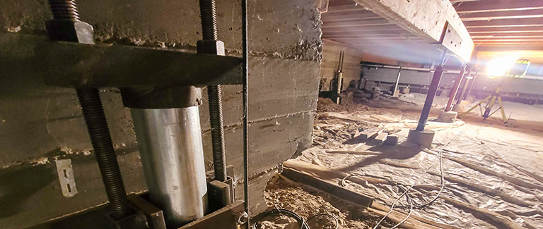 Foundation jack in basement