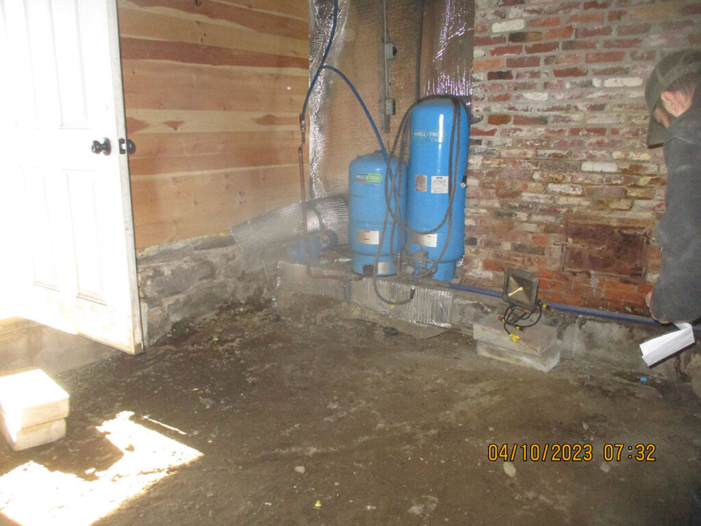 pumps in basement before Eastern Basements Projects