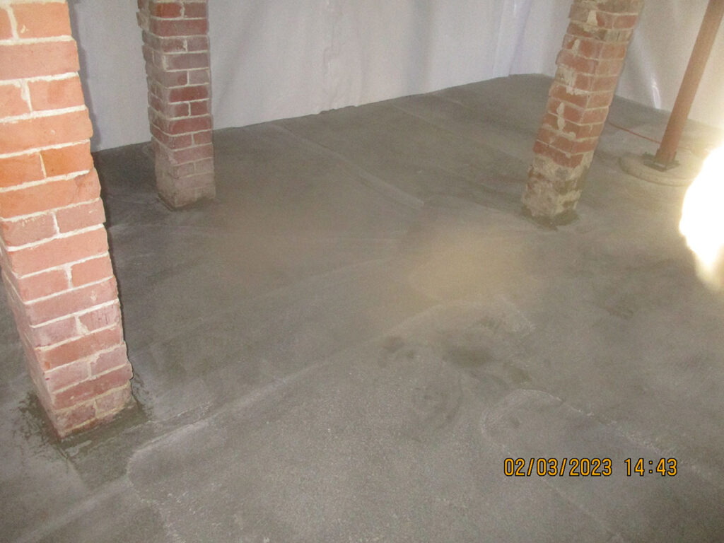 Basement with exposed brick after Eastern basements Projects